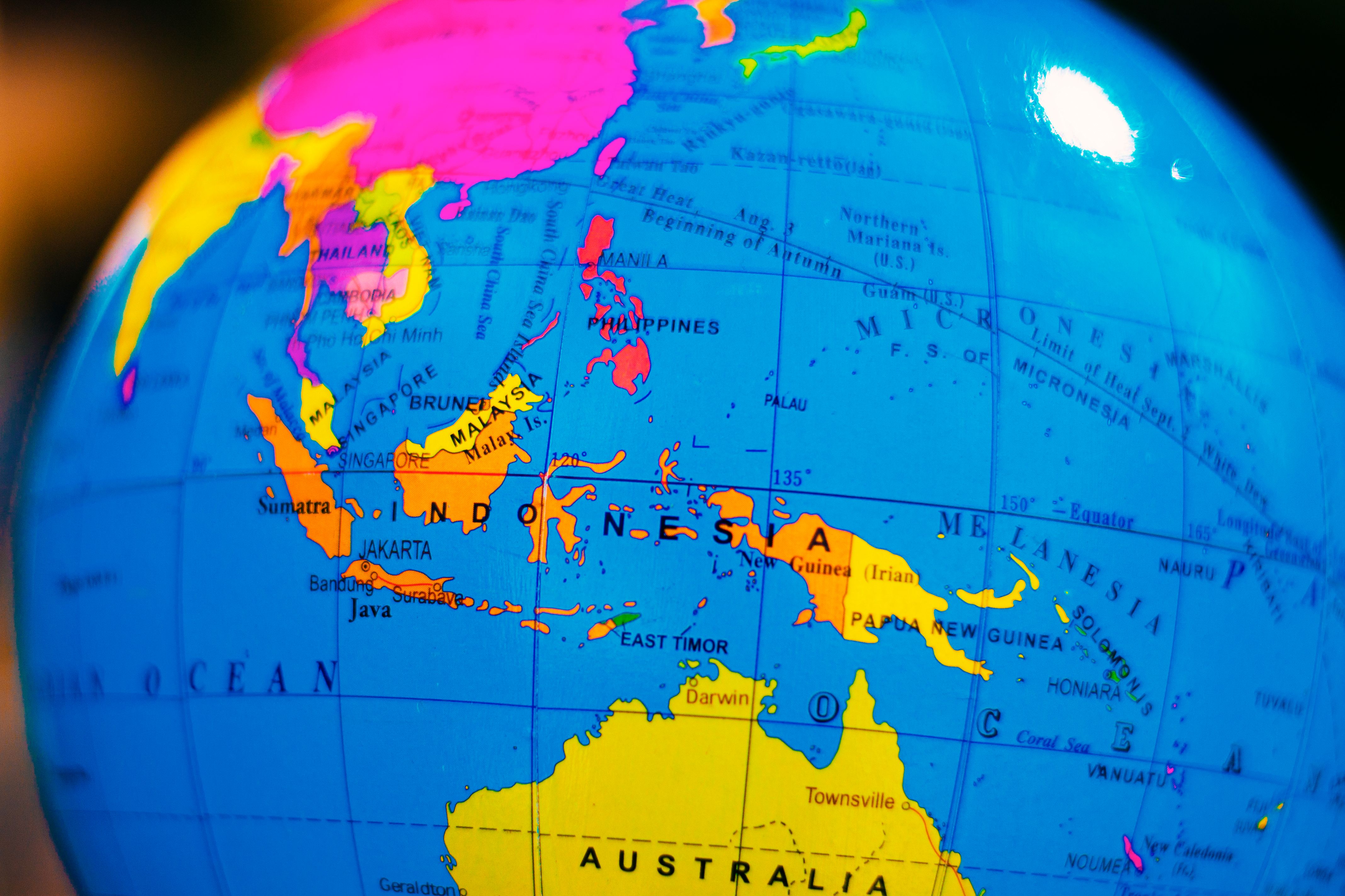 Globe highlighting Indonesia and surrounding countries in Southeast Asia